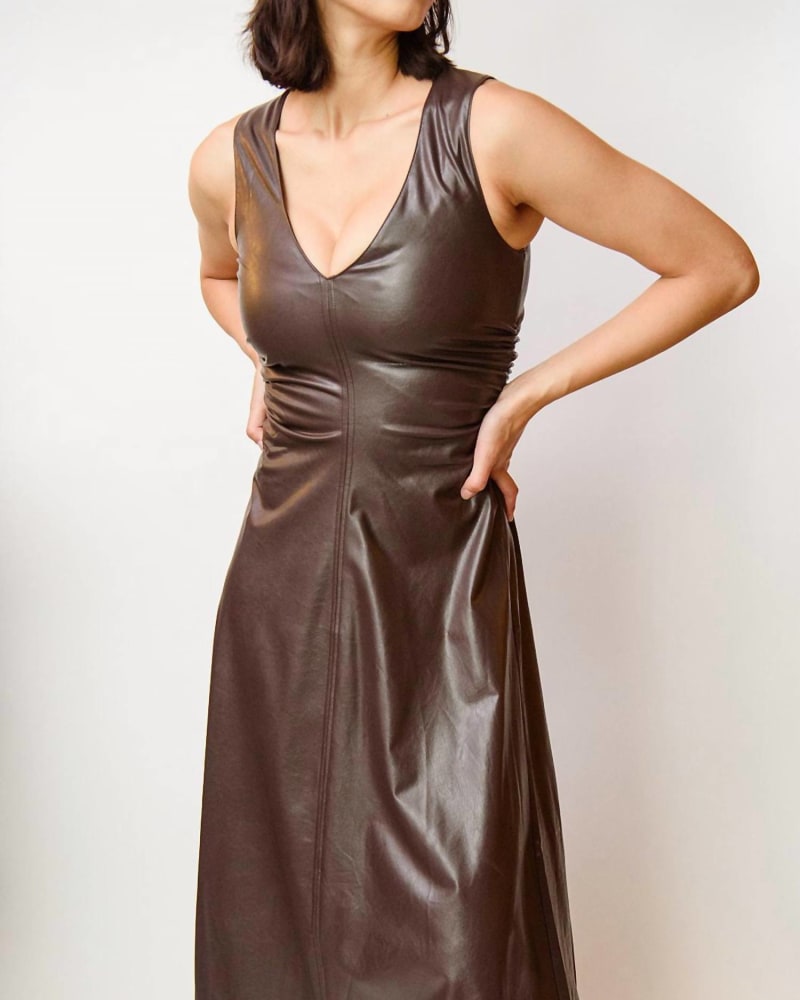 Front of a model wearing a size L Sabal Faux Leather Midi Dress in Chocolate in Chocolate by Amanda Uprichard. | dia_product_style_image_id:337428